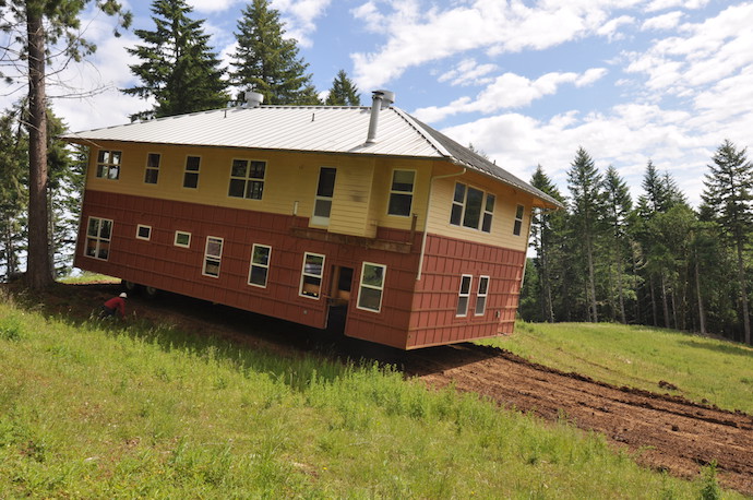 One of 2,000 homes moved by Northwest Structural Moving