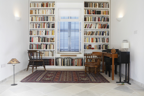 Interior of townhouse with books in library